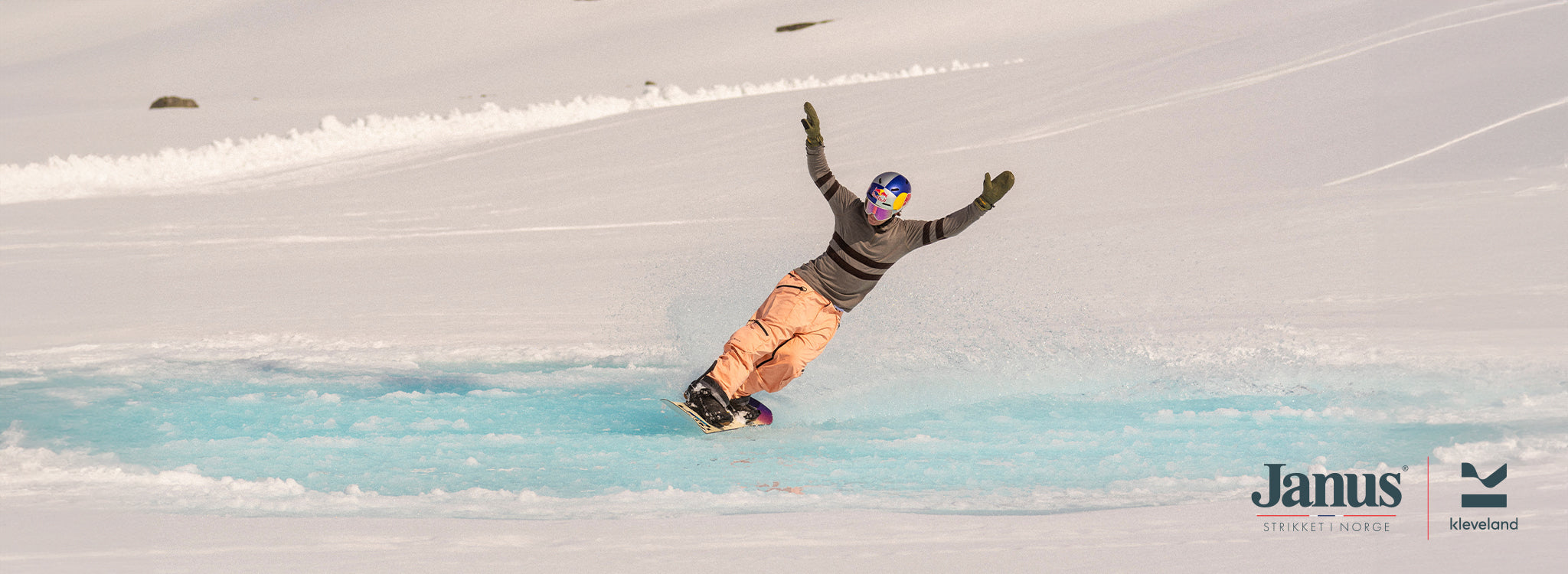 Marcus Kleveland på snowboard med Janus merinoull trøye i farge brun
