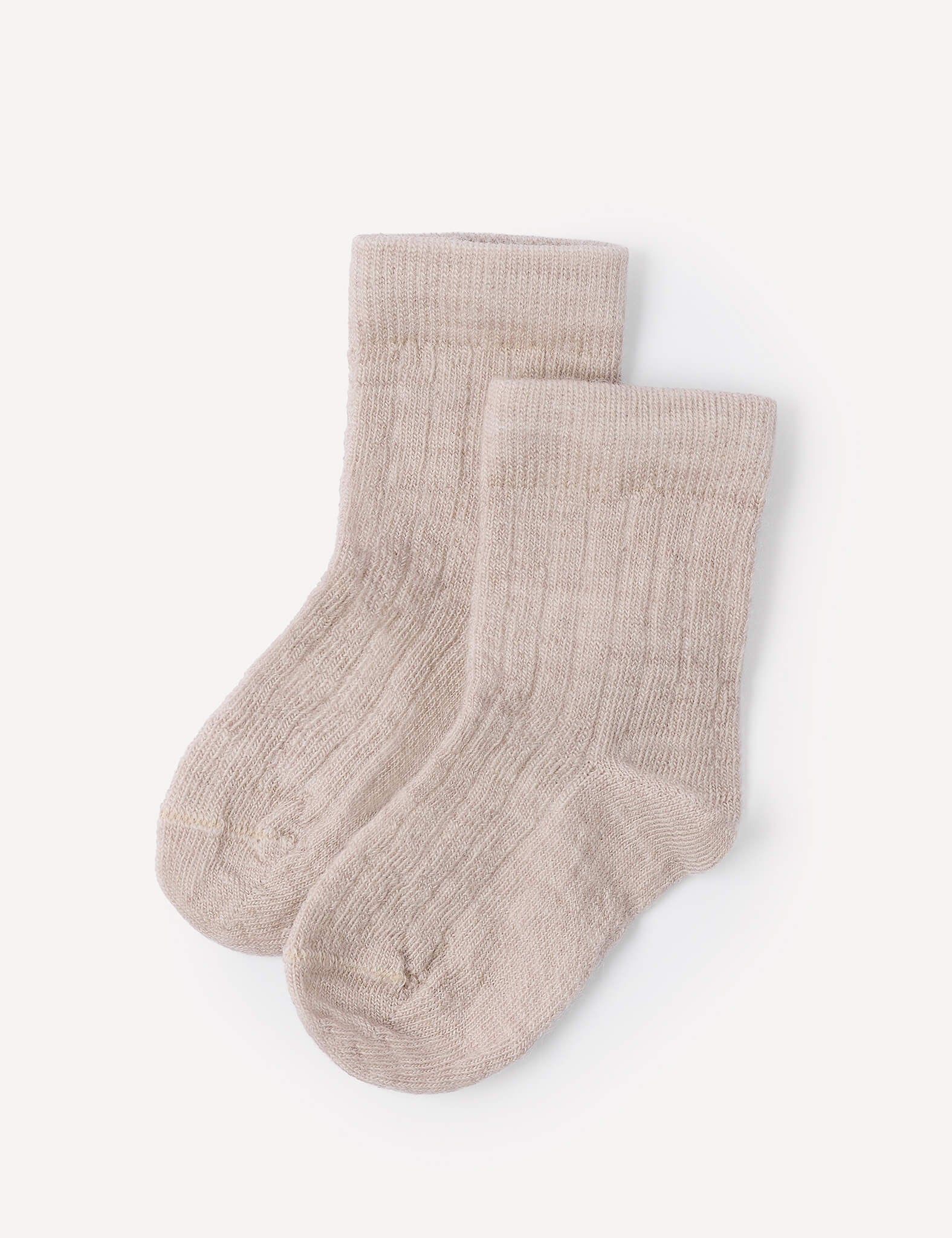 A pair of beige melange Socks – Merino Baby Light, featuring a ribbed knit design and durable construction, is neatly laid out on a plain white background.