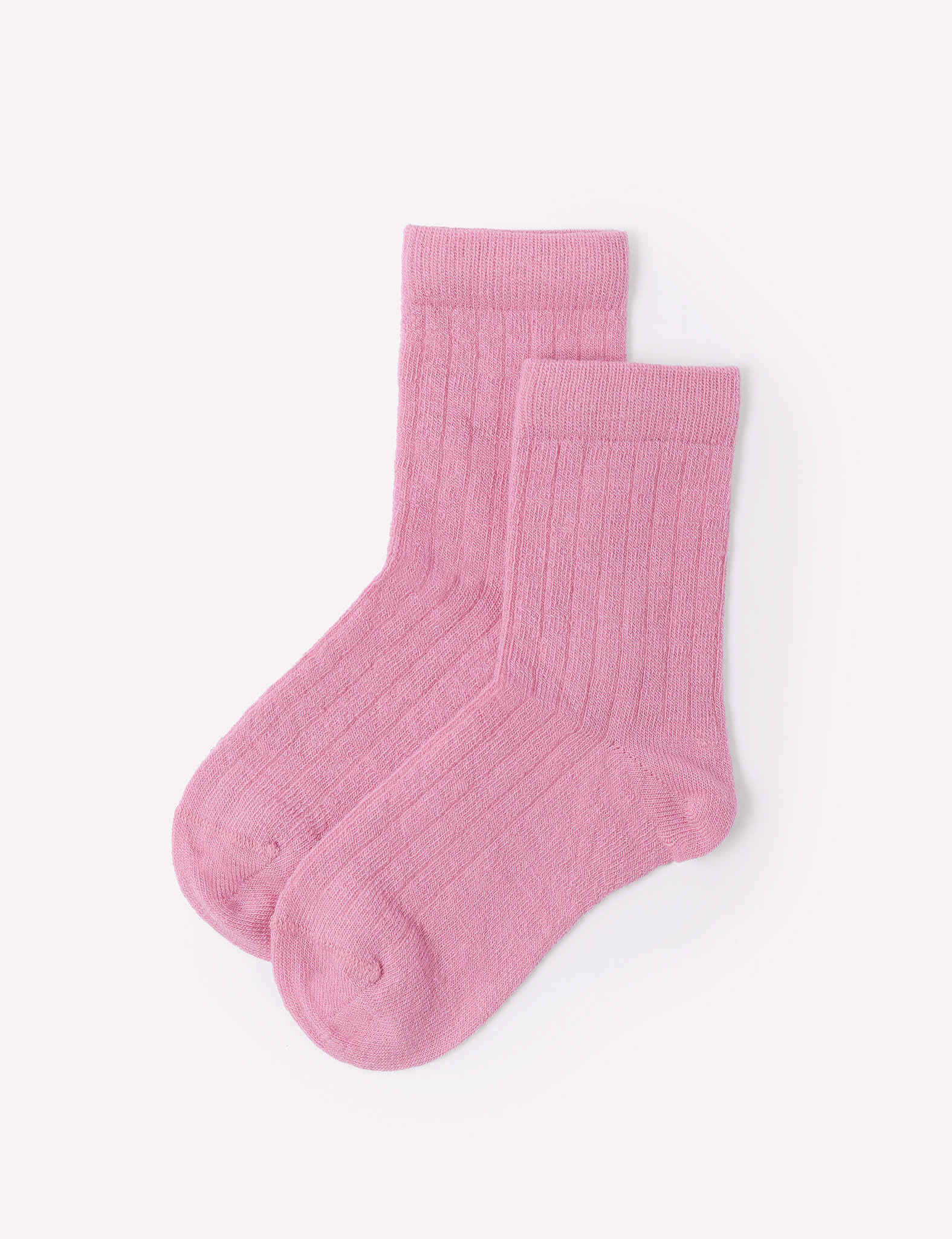 A pair of mauve orchid Daily Socks – Merino Kids is laid flat on a white background.