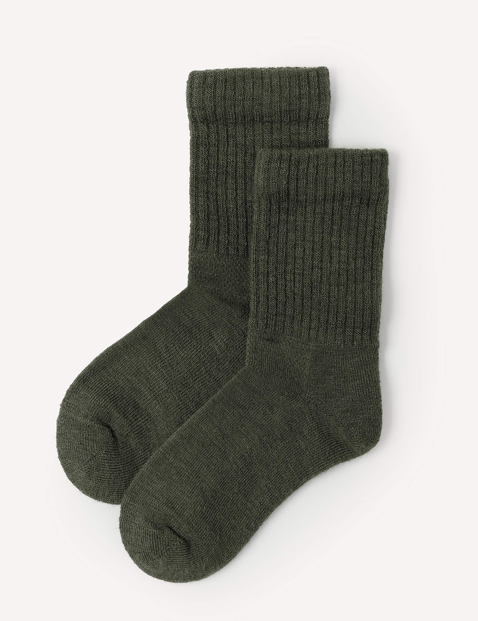 A pair of Terry Socks – Merino Kids in Forest Night are laid flat on a light background, with one sock slightly overlapping the other.