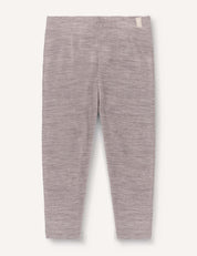 Beige melange lightweight Merino Baby Light leggings for children, shown flat against an off-white background. The leggings feature an elastic waistband and a small fabric tag on the upper right side, making them ideal as a comfortable base layer.
