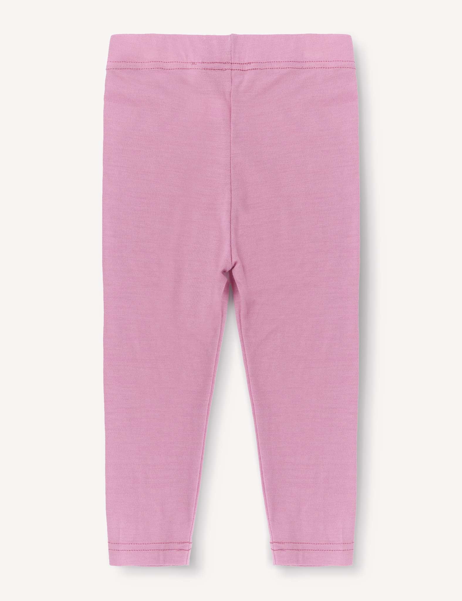 Leggings – Merino Baby Light in pink, shown flat from the back, feature an elastic waistband and simply hemmed ankles against a light background. These lightweight leggings are ideal for providing a comfortable base layer.