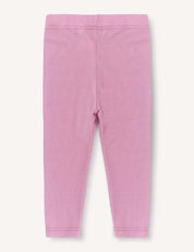 Leggings – Merino Baby Light in pink, shown flat from the back, feature an elastic waistband and simply hemmed ankles against a light background. These lightweight leggings are ideal for providing a comfortable base layer.