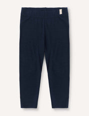 Navy Leggings – Merino Baby Light, full-length and lightweight for children, displayed flat against a white background. Featuring an elastic waistband and a small white tag on the right side near the top, these leggings are ideal as a comfortable base layer.