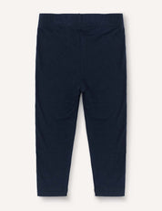 Leggings – Merino Baby Light in navy blue for toddlers, lightweight with an elastic waistband, shown flat on a light background from the back.