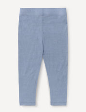 Light blue Leggings – Merino Baby Light laid flat and shown from the back, featuring a simple, unadorned design. These lightweight base layer leggings offer comfortable everyday wear for babies.