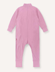 The Pyjamas – Merino Baby Light is a long-sleeved, light pink baby onesie displayed from the back, featuring cuffs at the wrists and ankles and a high neckline. Designed as breathable pyjamas, it ensures comfort for your little one.