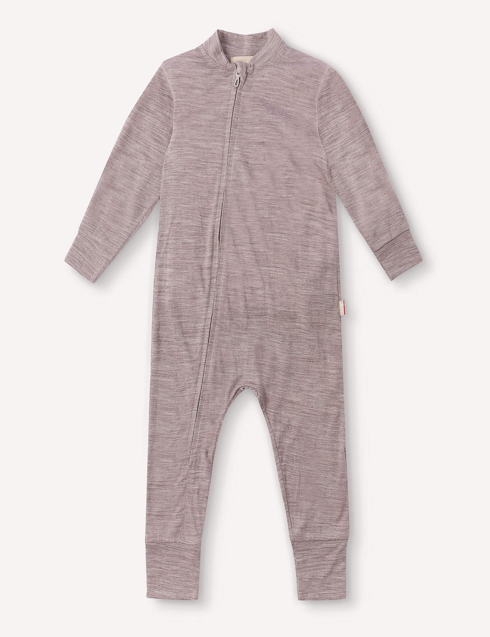 Beige melange long-sleeve baby jumpsuit with a front zipper that curves from the neck down to the left leg. Crafted from soft, stretchy, and lightweight merino fabric, it’s ideal for breathable sleepwear. The design is simple and free of patterns or prints. This product is called “Pyjamas – Merino Baby Light.”.