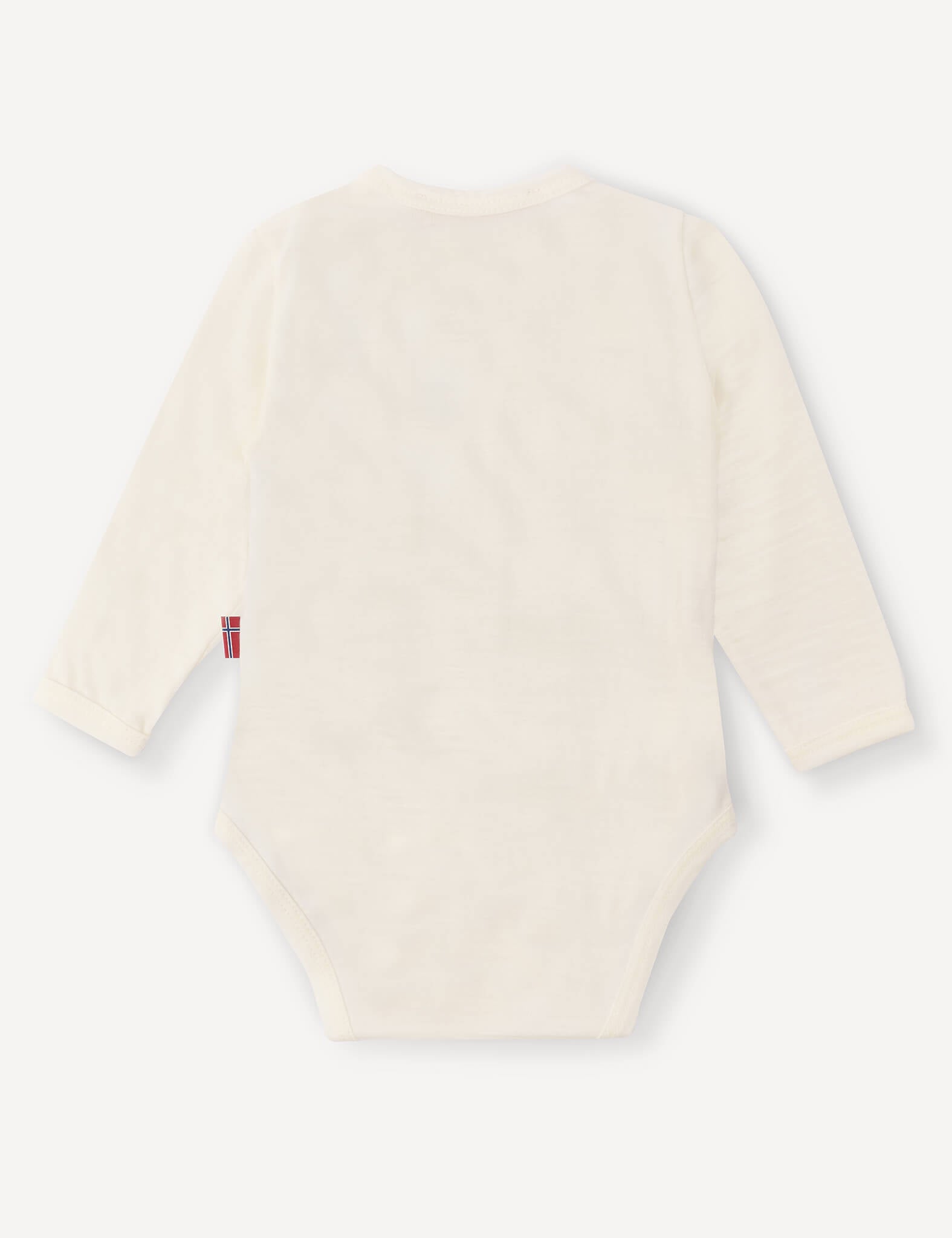A back view of the Wrapover Bodysuit – Merino Baby Light is shown, highlighting its long sleeves and off-white color. The left side seam features a small tag, and the soft, breathable fabric suggests comfort for babies.