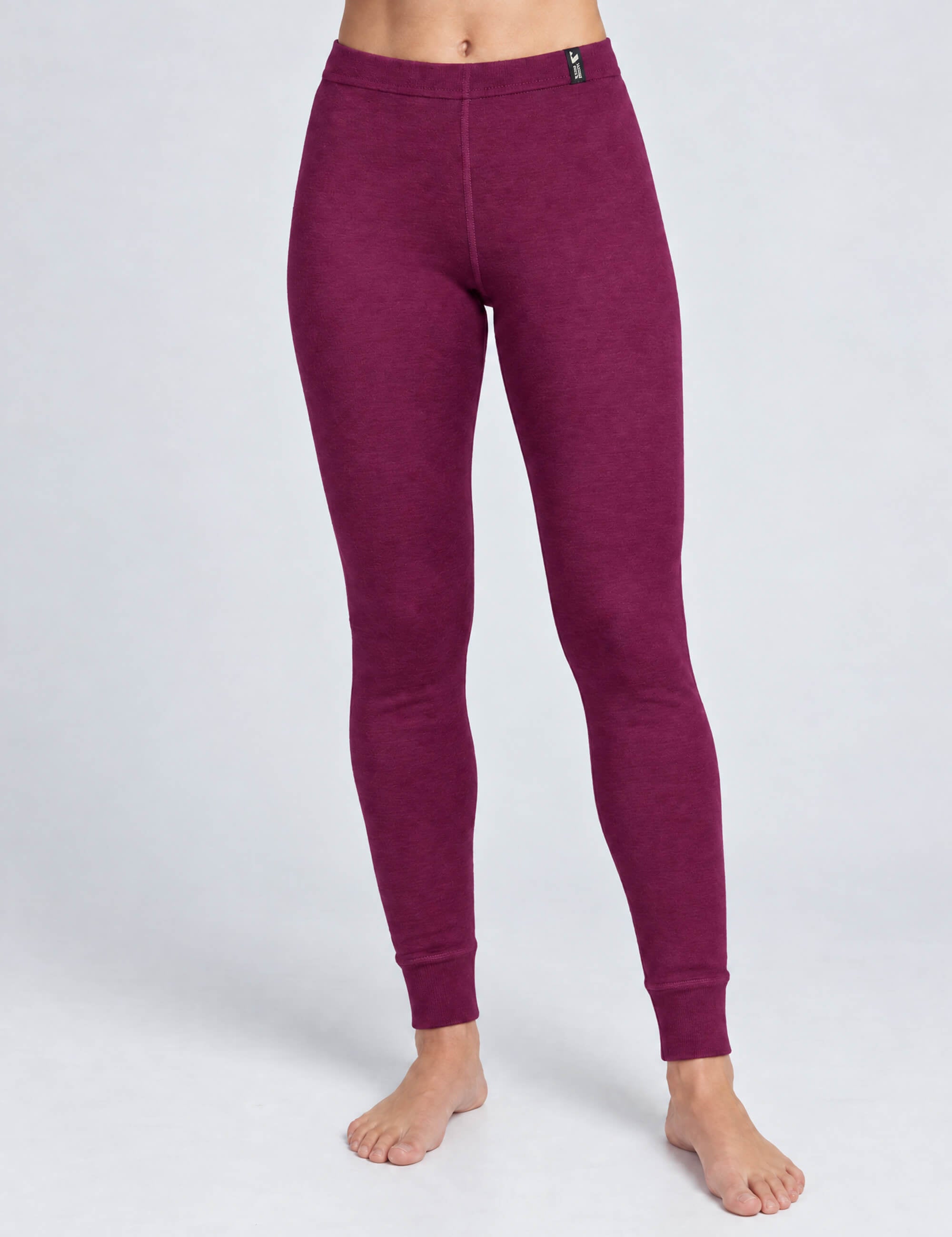 Plum-colored ribbed merino wool leggings with fitted cuffs from the Wool Set – Classic Merino 200 Rib Women.