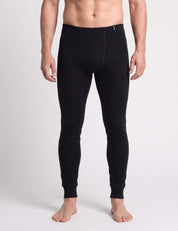A man wearing black ribbed merino wool Wool Set – Classic Merino 200 Rib Men long johns.