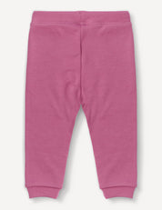 Pants – Merino Baby AirWool in pink, crafted from soft fabric, displayed flat on a white background; these pants feature a relaxed fit with elastic cuffs at the ankles and a comfortable, stretchy waistband.