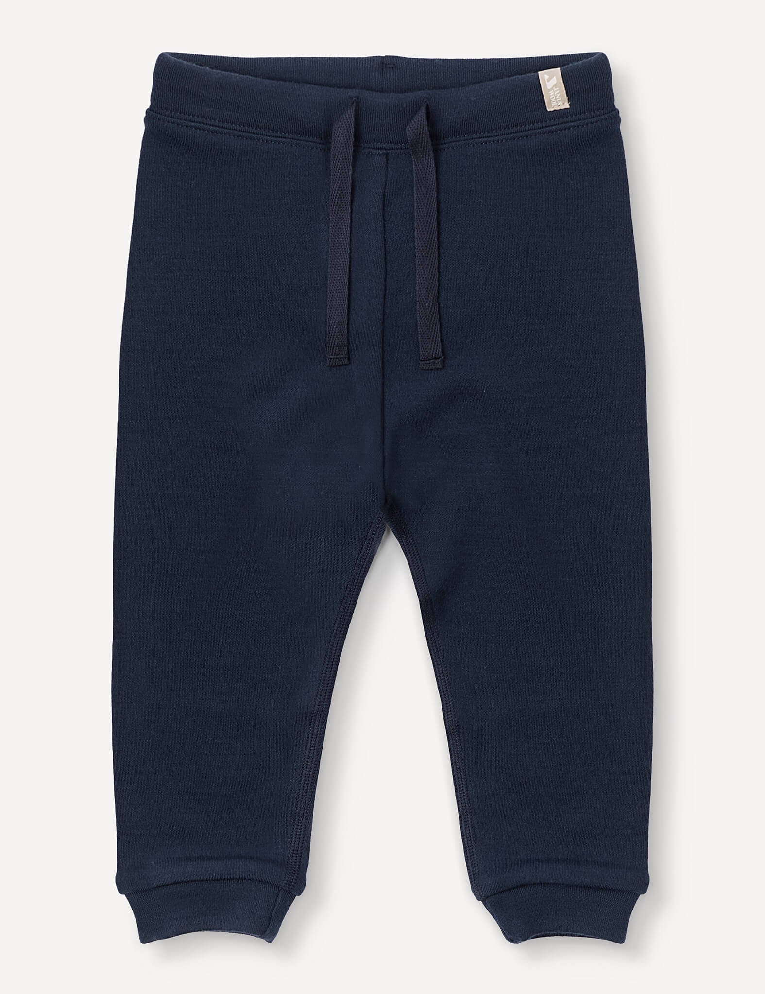 Navy blue Merino Baby AirWool pants featuring an adjustable drawcord waistband, ribbed cuffs, and a small tag on the waistband.