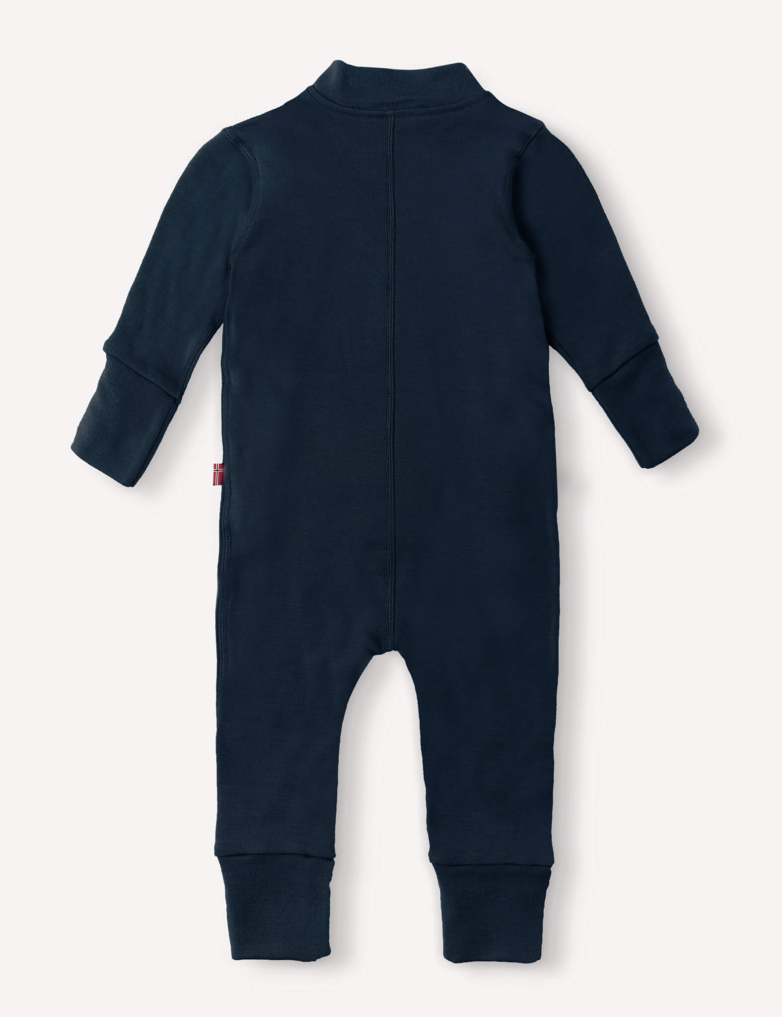 Navy blue Onesie – Merino Baby AirWool with long sleeves and feet exposed, shown from the back and laid flat on a white background. Crafted from soft merino wool suit fabric for cozy comfort.