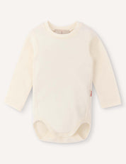 A long-sleeve, marshmallow-colored Body – Merino Baby AirWool bodysuit with snap buttons at the bottom, displayed flat on a light background for breathable comfort.