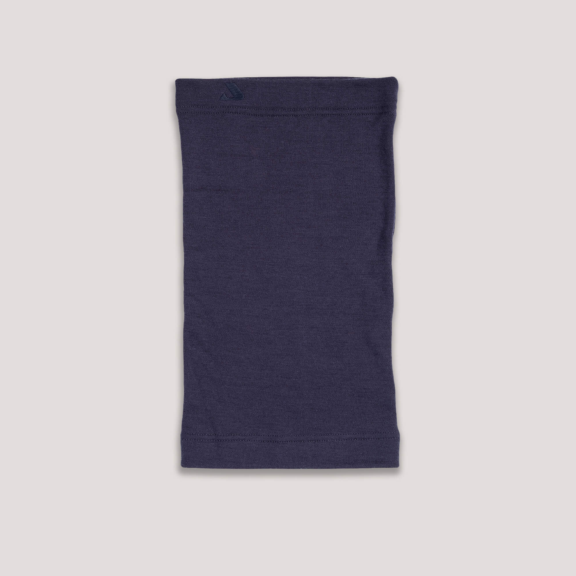 The Neck Warmer Merino – AirWool 260 in navy is laid flat on a light background, showcasing its breathable merino wool construction for superior warmth.