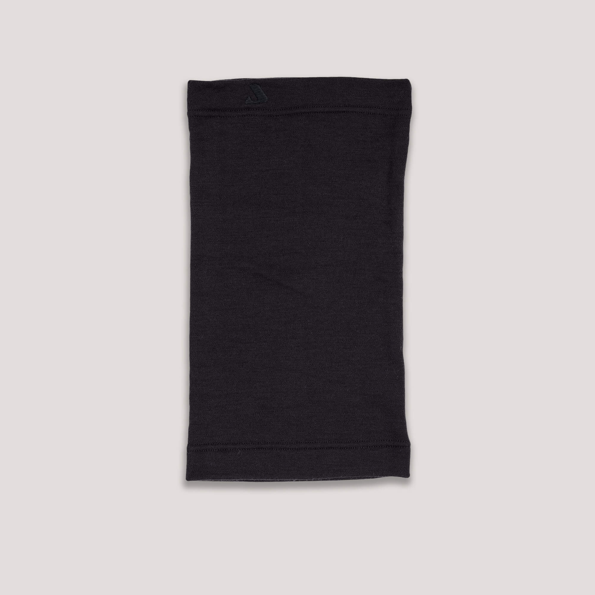 The Neck Warmer Merino – AirWool 260 in black is shown laid flat on a light grey background, highlighting its warmth and breathability.