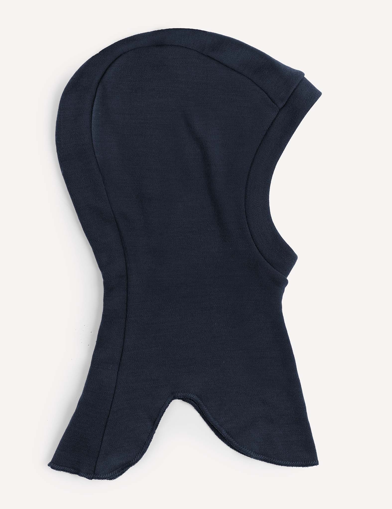 The Balaclava – Merino Kids AirWool in navy is crafted from soft merino wool. Displayed on a plain white background, it features a rounded top and a flared bottom for added neck coverage, ensuring warmth and comfort.