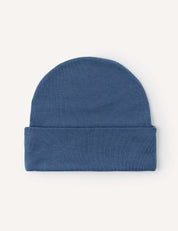 A blue Beanie – Merino Kids AirWool, crafted from breathable merino wool with a folded brim, displayed flat against a plain, light background. This hat is designed to keep you extra warm.