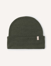 A folded Forest Night Beanie – Merino Kids AirWool, featuring a small beige tag on the cuff, is displayed on a plain light background. This breathable merino wool hat is designed to keep you extra warm.