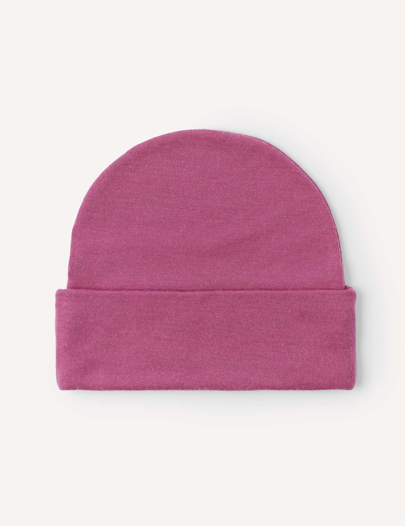 The Beanie – Merino Kids AirWool, in a folded pink design, is displayed flat on a white background, providing extra warmth and breathable comfort.