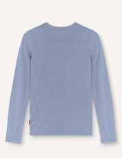 The Crewneck – Merino Kids Light, a plain light blue long-sleeve shirt crafted from soft wool, is displayed from the back against a neutral background.