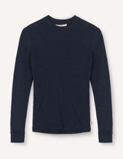 A Crewneck – Merino Kids Classic Rib shirt in Navy, featuring long sleeves and crafted from soft merino wool, is laid flat against a white background.