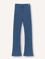 Ensign Blue Flarepants – Merino Kids AirWool with a drawstring waist, displayed flat on a white background. These pants have a relaxed fit and are crafted from soft, comfortable merino wool fabric.