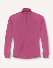 The Half Zip – Merino Kids AirWool is a magenta long-sleeve shirt with raglan sleeves, a high neck, ribbed cuffs, and a partial front zipper, displayed on a white background.