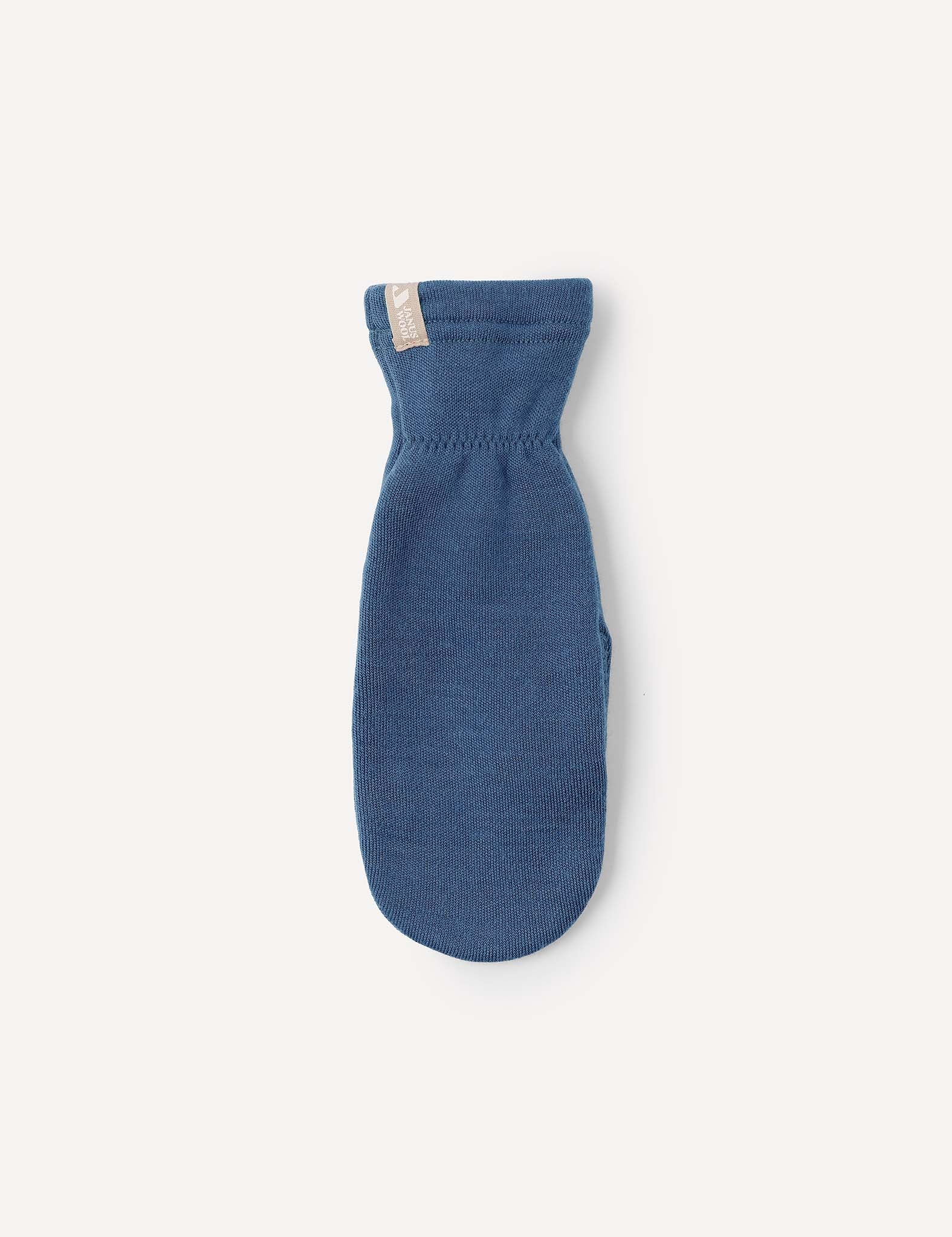 A single blue Merino Kids AirWool mitten is displayed against a plain light background, featuring a small beige tag attached near the cuff.