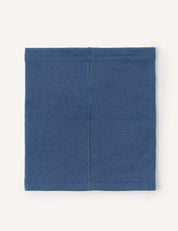 The Neckwarmer – Merino Kids AirWool in blue is laid flat, displaying a visible vertical center seam. The stitching around the edges and its simple rectangular design are clearly shown.