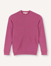 A Pullover – Merino Kids AirWool sweater in a solid magenta color, featuring long sleeves and a crew neck, is laid flat on a white background.