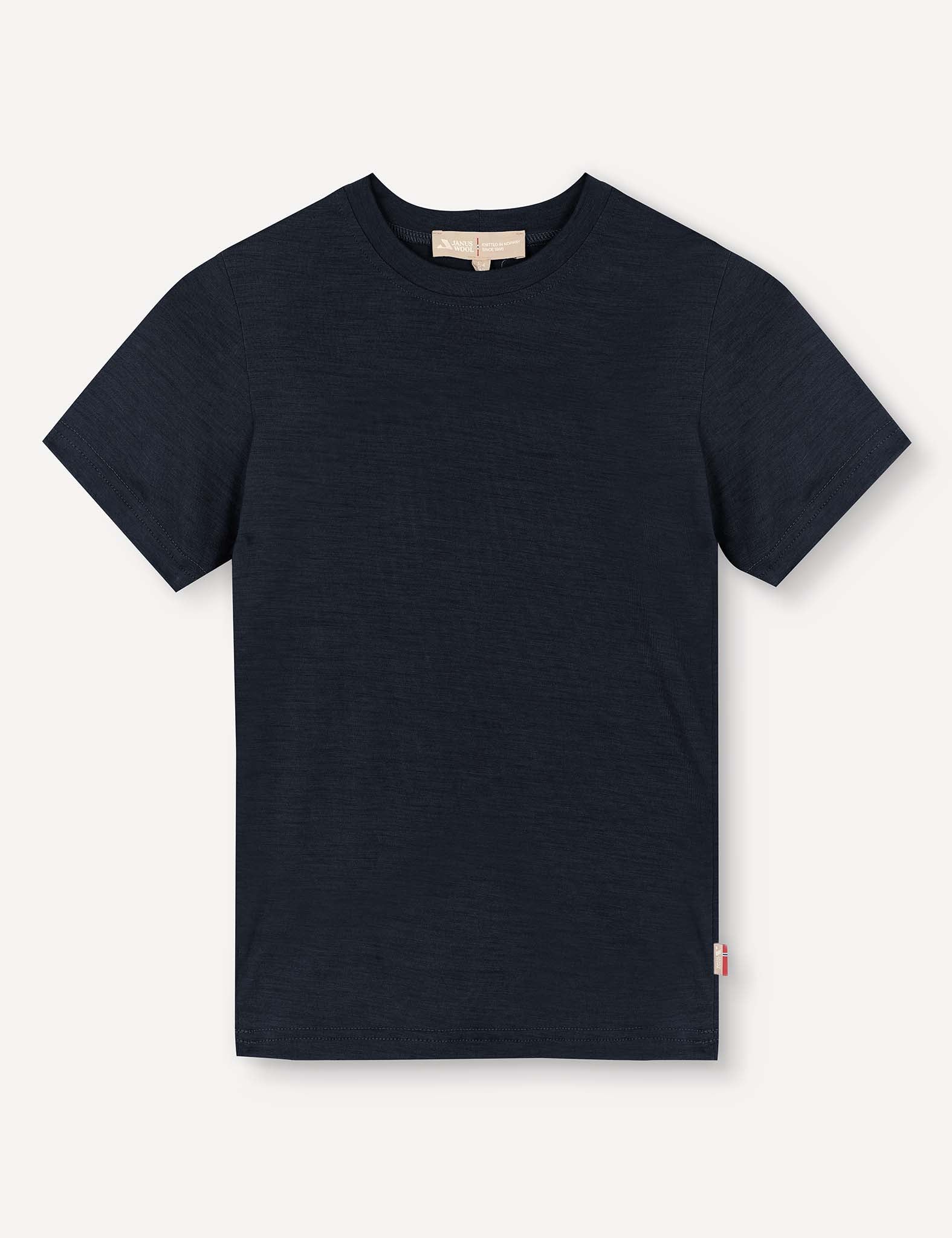 The T-Shirt – Merino Kids Light in Navy is displayed flat against a light background, offering all-day comfort and natural temperature regulation.